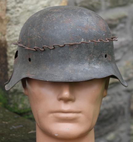 GERMAN HEER  M42 CAMO HELMET WITH WIRE - BATTLE DAMAGED -