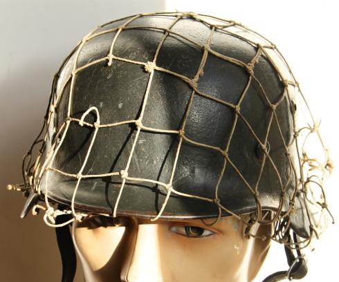 WW2 GERMAN M35 HELMET C/W ORIGINAL CAMO NET- ET 64