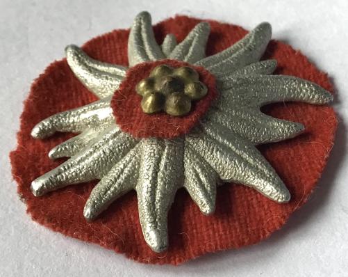 GERMAN WW2 EDLEWEISS ON RED BACKING PATCH INSIGNIA