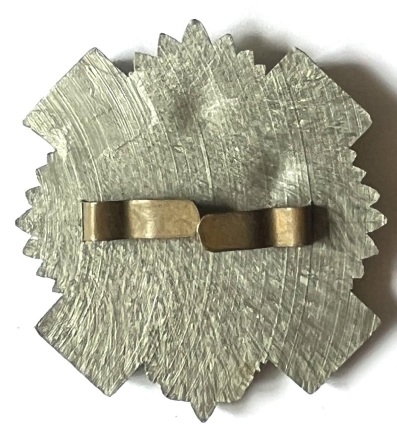WW2 HLI (HIGHLAND LIGHT INFANTRY) PLASTIC ECONOMY CAP BADGE